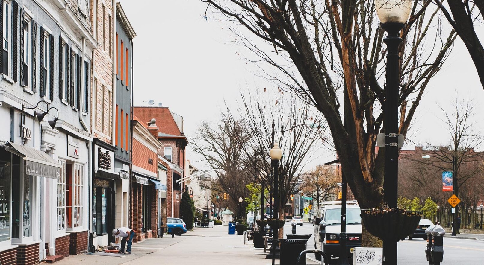 main street in downtown princeton, nj. store fronts along a sidewalk